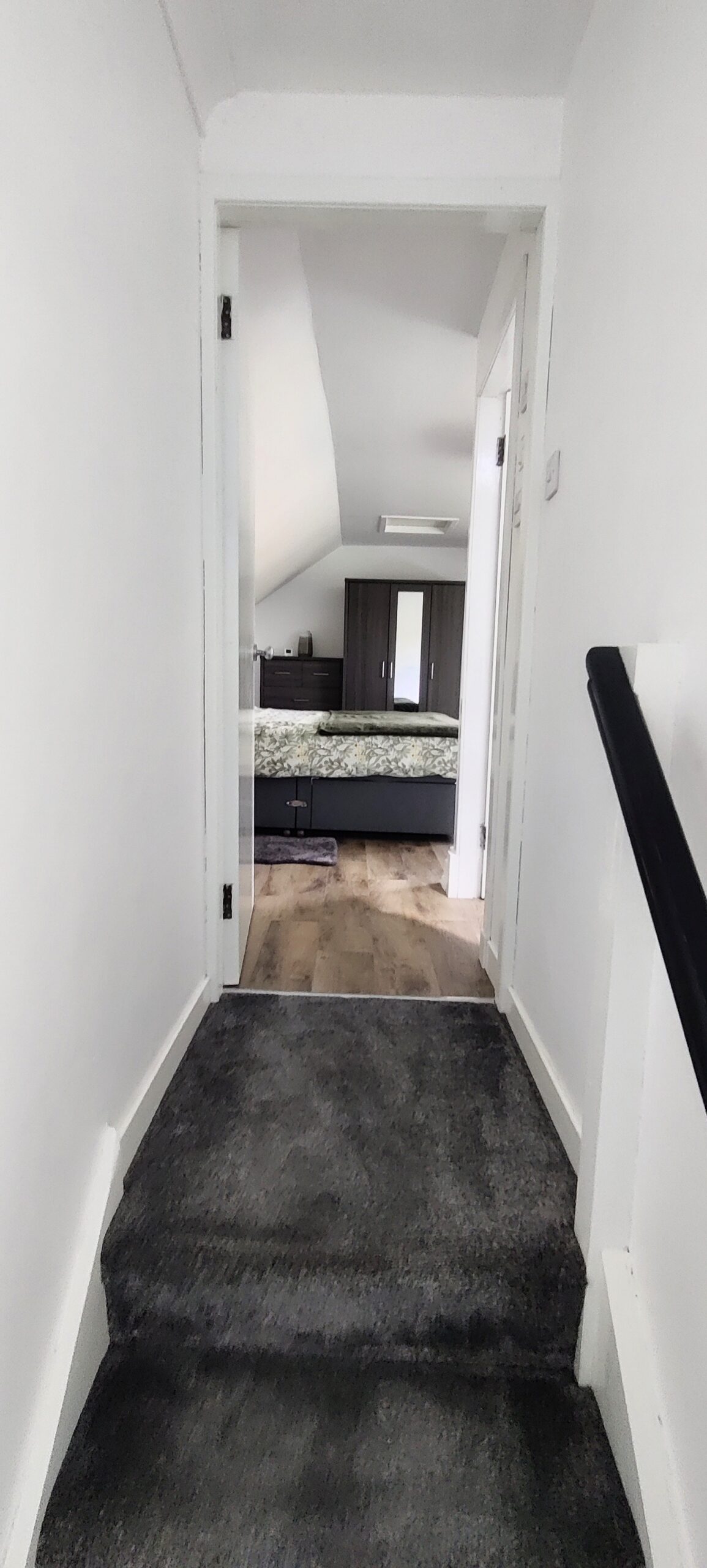 Entrance to bedroom from top of stairs