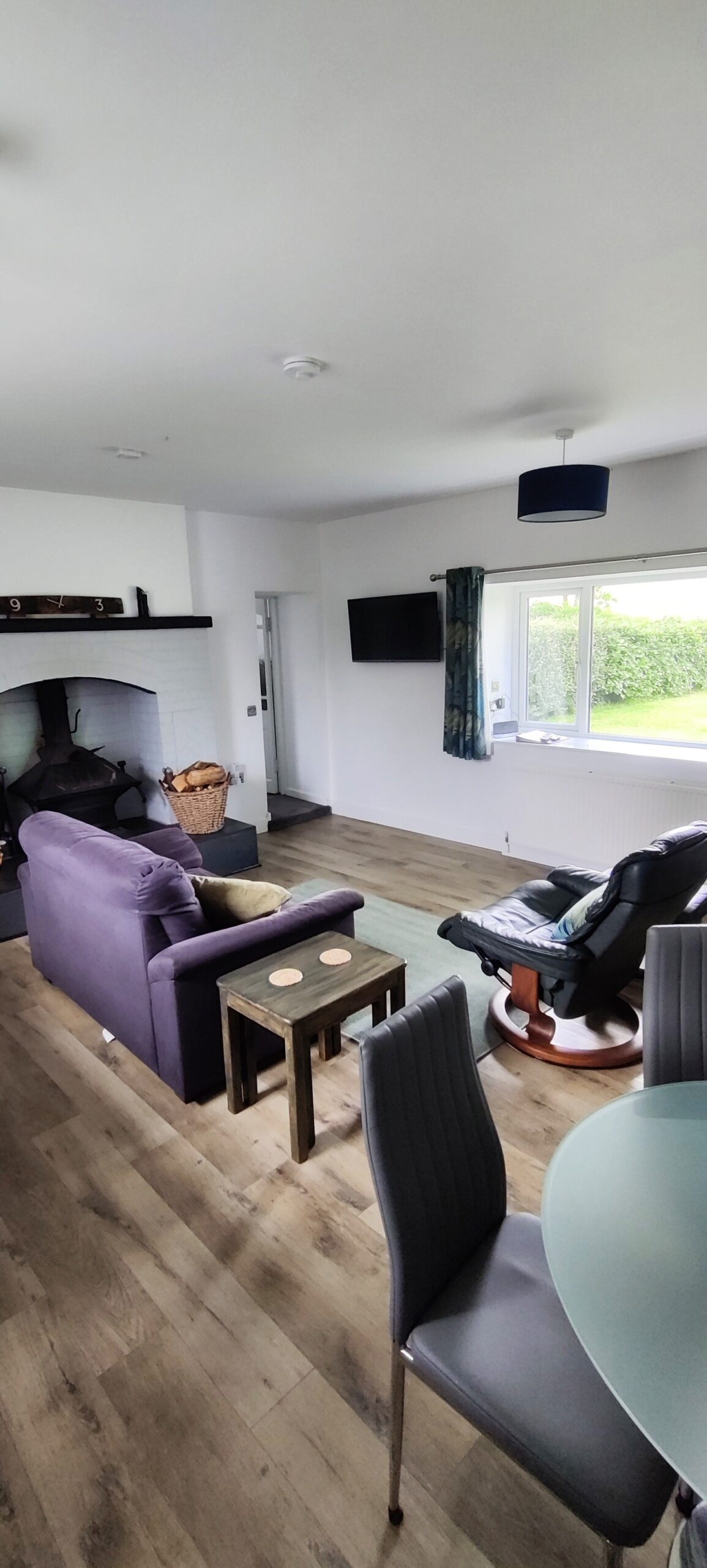 Lounge with dining table in foreground